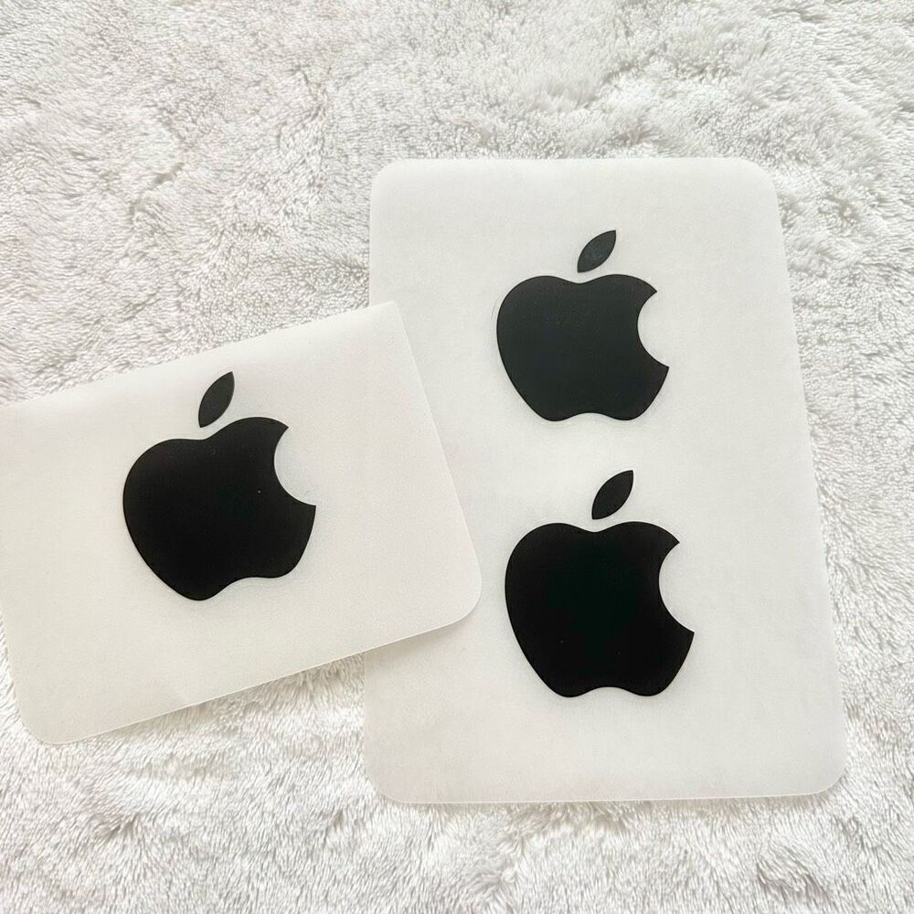 Set of three black apple stickers ￼